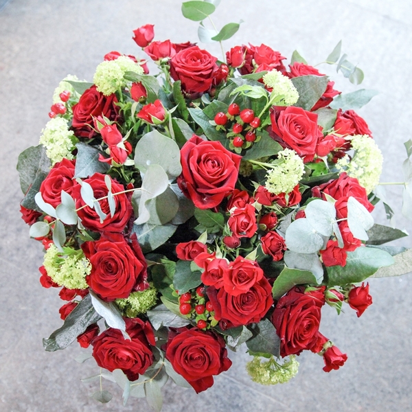 24 Deluxe Naomi Red Roses with Green Shamrocks 